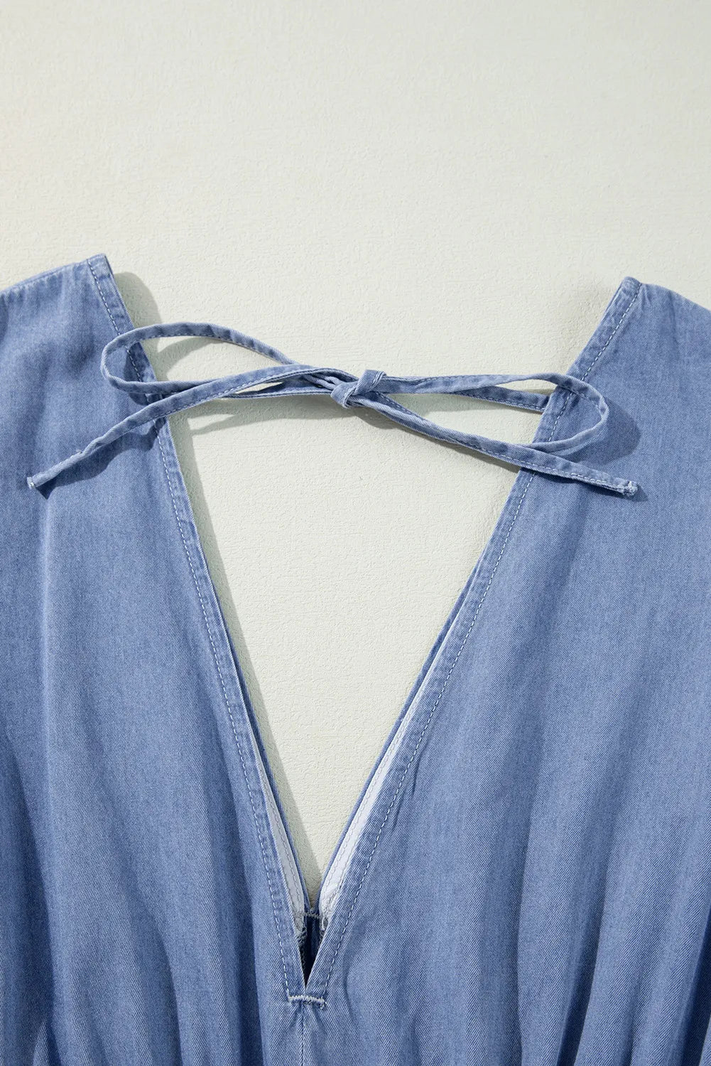Tied Plunge Three-Quarter Sleeve Denim Dress.